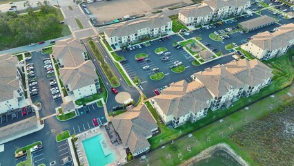 Wall Mural - Aerial view of american apartment buildings in Florida residential area. New family condos as example of housing development in US suburbs