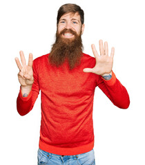 Poster - Redhead man with long beard wearing casual clothes showing and pointing up with fingers number eight while smiling confident and happy.