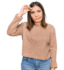 Canvas Print - Young beautiful woman wearing casual clothes worried and stressed about a problem with hand on forehead, nervous and anxious for crisis