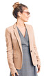 © Krakenimages.com - Beautiful caucasian woman with blonde hair wearing business jacket and glasses looking away to side with smile on face, natural expression. laughing confident.