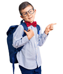 Sticker - Cute blond kid wearing nerd bow tie and backpack smiling happy pointing with hand and finger to the side