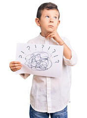 Sticker - Cute blond kid holding scribble draw serious face thinking about question with hand on chin, thoughtful about confusing idea