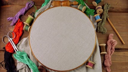 Wall Mural - Embroidery needlework background Linen in hoop mockup. Colorful floss thread scissors card tag. Handmade ethnic style clothes making home decor tablecloth. New normal lockdown hobby crafts tutorial.