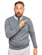 © Krakenimages.com - Handsome middle age man wearing business clothes surprised pointing with finger to the side, open mouth amazed expression.