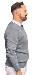 Sticker - Handsome middle age man wearing business clothes looking to side, relax profile pose with natural face and confident smile.