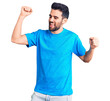 © Krakenimages.com - Young handsome man with beard wearing casual t-shirt dancing happy and cheerful, smiling moving casual and confident listening to music