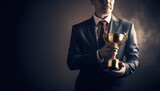 Fototapeta  - Celebratory moment, a successful individual businessman holds a prestigious trophy, representing their remarkable achievement and business success. Generative AI