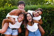 © ADDICTIVE STOCK - Company of cheerful women having fun in city