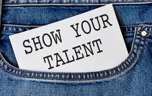 Piece Of Paper With Text Show Your Talent An Inscription Peeks Out In A Jeans Pocket