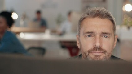Glasses, computer or man reading email or online research report in office with focus for serious planning. Pc, concentration or senior journalist proofreading article on digital news website or blog