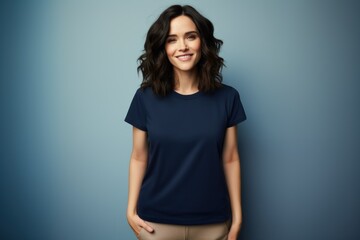 Portrait of a beautiful fictional woman smiling. Brunette model wearing a navy blue t-shirt, isolated on a plain colored background. Generative AI illustration.