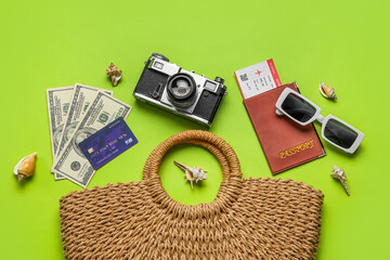 Sticker - Composition with female bag, sunglasses, credit card and photo camera on green background