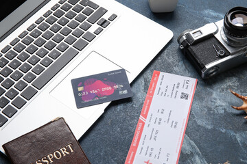 Sticker - Modern laptop, credit card and ticket on color background, closeup