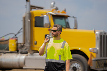 supervisor in hard hat and safety vests drink coffee in building site. supervisor man at construction site. worker at coffee break. male supervisor at working location. supervisor at the construction