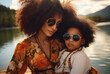 © Kordiush - African American woman in fluffy curly hair hugs her daughter. They are smiling and happy. They are wearing glasses. Generative AI