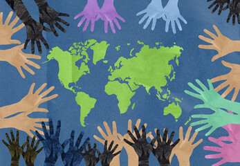  Paper multi-colored hands reach for the continents of the earth, the concept of maintaining peace on the planet