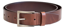 A Rolled-up Brown Leather Belt With A Metal Buckle Isolated.