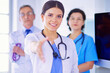 © lenets_tan - Female doctor offering a handshake in the hospital