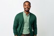 © Anne Schaum - happy african american man in green shirt, isolated on grey