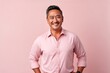 © Leon Waltz - Portrait of a smiling asian man in pink shirt on pink background