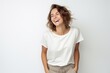 © Robert MEYNER - Portrait of a happy young woman laughing isolated on a white background