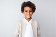 © Robert MEYNER - Portrait of a smiling african american little boy isolated on a white background