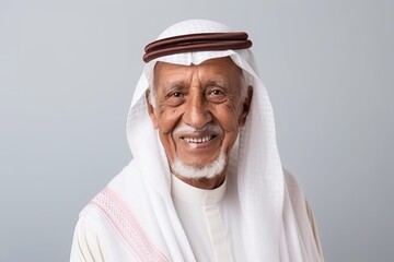 Wall Mural - Portrait of mature arabian man smiling and looking at camera