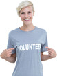 Digital png photo of caucasian woman with volunteer text on shirt on transparent background