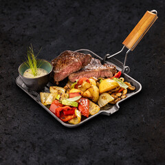 Wall Mural - Grilled pork chops with roasted vegetables