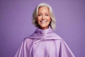 Sticker - Medium shot portrait photography of a glad mature woman wearing a unique poncho against a lilac purple background. With generative AI technology