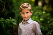 © Markus Schröder - Close-up portrait photography of a glad mature boy wearing a classy button-up shirt against a lush garden background. With generative AI technology