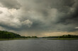 Cloudy, rainy clouds over the lake
