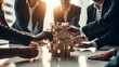 © Nataliya - A successful businesswoman/m businessman conducting a team-building activity, fostering collaboration and camaraderie Generative AI