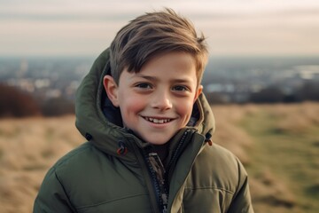 Wall Mural - Lifestyle portrait photography of a grinning boy in his 30s wearing a warm parka against a historic battlefield background. With generative AI technology
