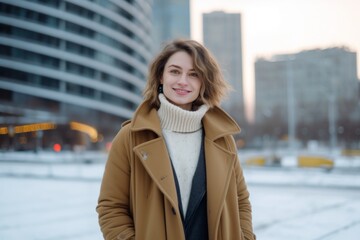 Sticker - Urban fashion portrait photography of a glad girl in her 30s wearing a cozy winter coat against a modern office building background. With generative AI technology