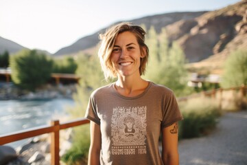 Wall Mural - Medium shot portrait photography of a tender girl in her 30s wearing a fun graphic tee against a scenic hot springs background. With generative AI technology