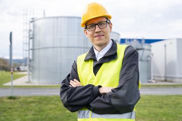 Poster - Portrait of engineer in helmet and glasses.