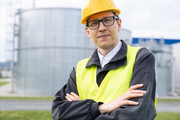 Poster - Portrait of engineer in helmet and glasses.