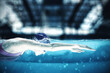 © alphaspirit - Sporty athlete swims with energy during a competition in the pool