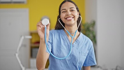 Sticker - African american woman doctor smiling confident holding stethoscope at clinic