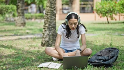 Poster - African american woman student having video call taking notes at university campus