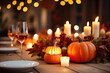 Thanksgiving table setting with pumpkins and candles. Autumn home decoration.