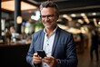 © FrankBoston - Attractive businessman using his smartphone in a cafe, generative ai