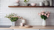 © Joel Valdez - Closeup of kitchen interior. White brick wall, metro tiles, wooden countertops with kitchen utensils. Roses flowers in black sink. Modern scandinavian design. Home staging, cleaning concept.