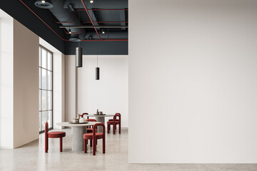 Stylish restaurant interior with chairs and table in row, window. Mock up wall