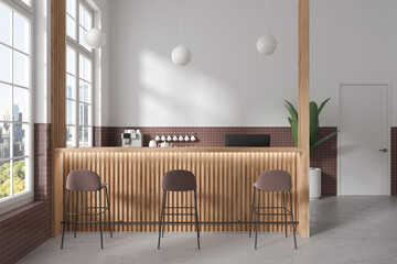 White and brown tile coffee shop interior with bar