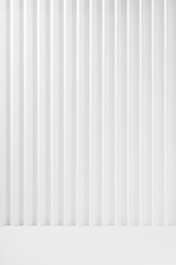 Poster - white abstract background of vertical striped rippled pattern, perspective, floor, stage mockup for 