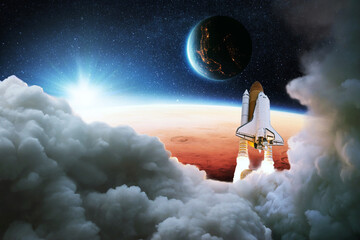Aufkleber - Space shuttle rocket with puffs of smoke successfully takes off to the red planet Mars and blue planet Earth at sunset. Rocket lift off. Successful start of a space mission. Travel to Mars