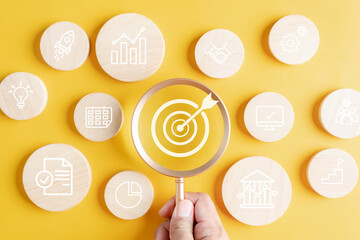 Leinwandbilder - Magnifier glass focus to target objective with business icons. planning development leadership and customer target group concept...