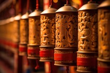 Gold And Red Tibetan Prayer Wheels Spinning In A Temple